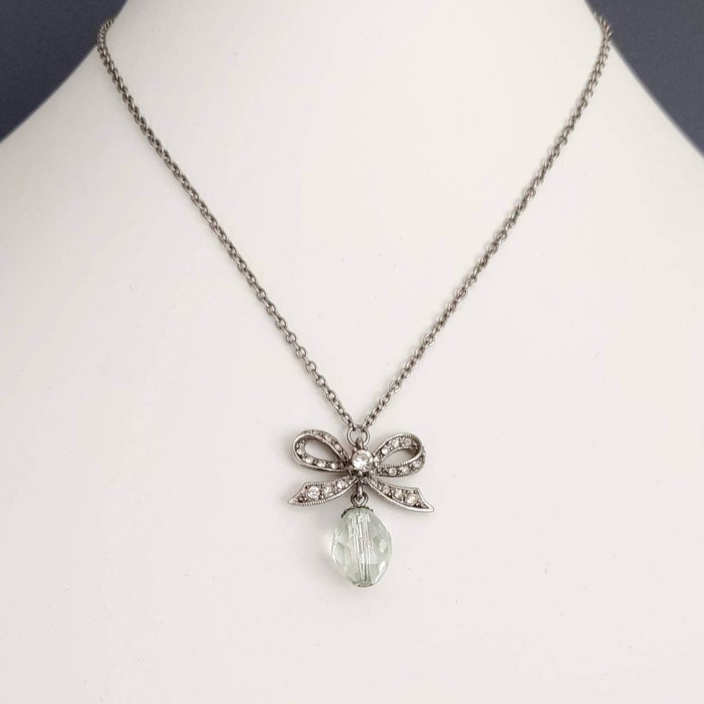 Silver bow w/crystals and clear bead drop necklace
